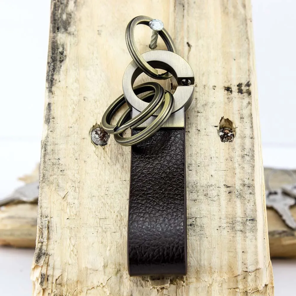 TROIKA Key-Click Leather Keychain with Click Mechanism - Brown/Antique Gold